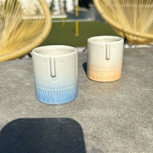 I’m selling TWO tiny pots. Our house doesn’t work with the pots.